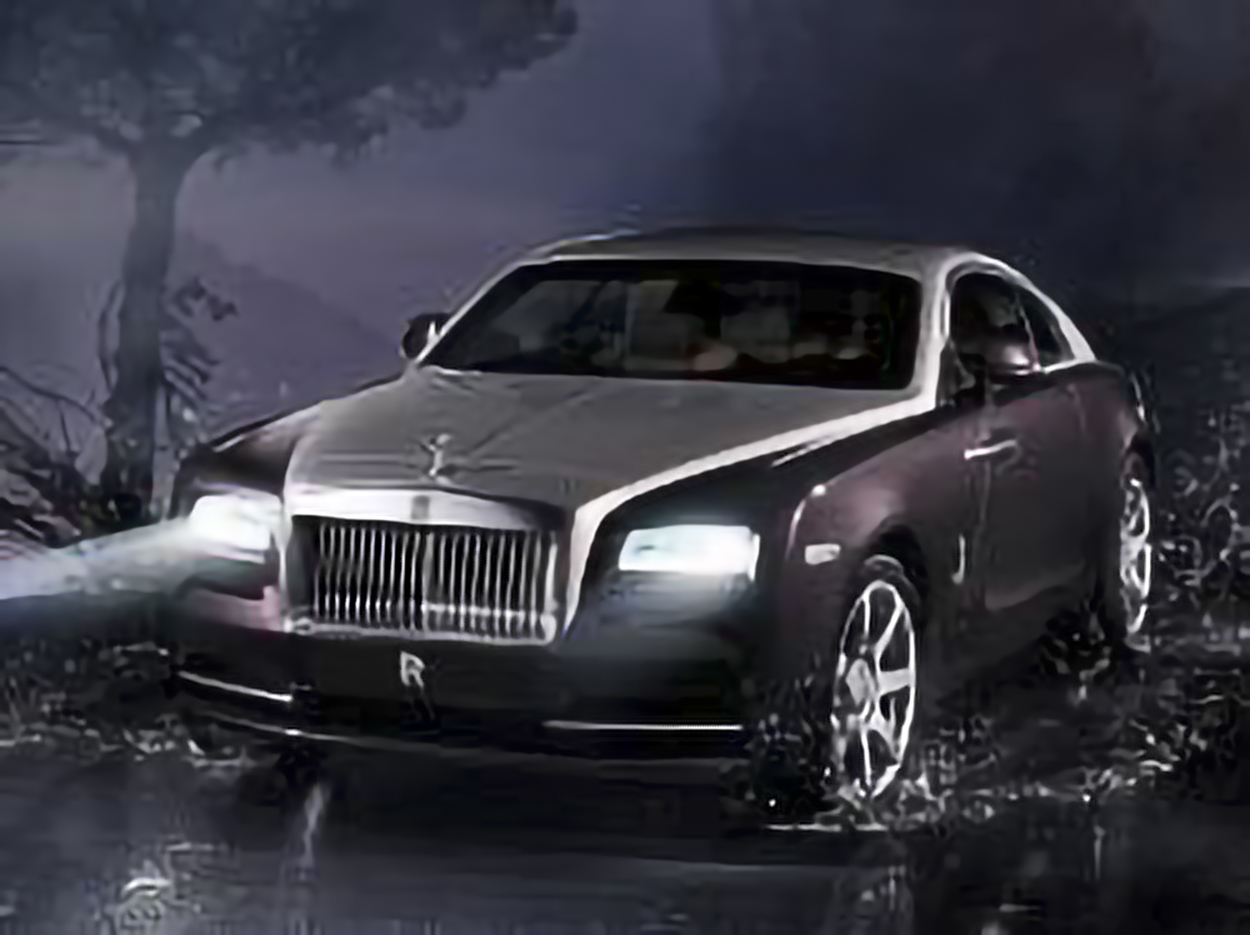 Rolls-Royce Wraith 2dr Coupe (6.6L 12cyl Turbo 8A) – årsmodell 2014 i bild Bild på Rolls-Royce Wraith 2dr Coupe (6.6L 12cyl Turbo 8A) – årsmodell 2014