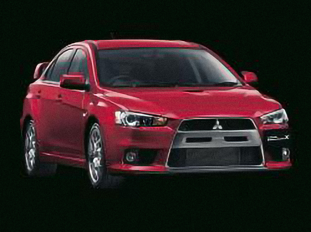 Mitsubishi Lancer Evolution MR 4dr Sedan AWD (2.0L 4cyl Turbo 6AM) – årsmodell 2018 i bild Bild på Mitsubishi Lancer Evolution MR 4dr Sedan AWD (2.0L 4cyl Turbo 6AM) – årsmodell 2018