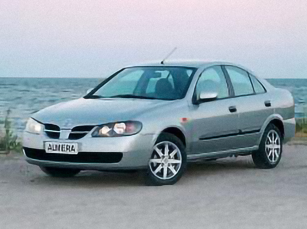 Nissan Almera 1.6 Elegance – årsmodell 2005 i bild Bild på Nissan Almera 1.6 Elegance – årsmodell 2005