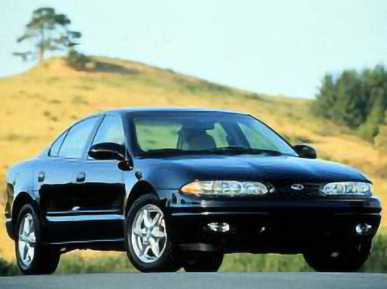 Oldsmobile Alero GX Sedan – årsmodell 2004 i bild Bild på Oldsmobile Alero GX Sedan – årsmodell 2004