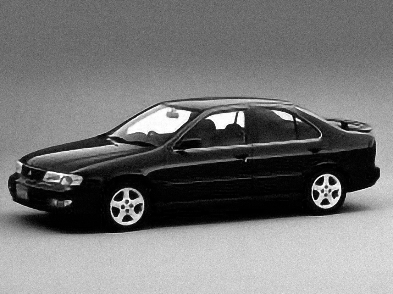 Nissan Sunny Wagon – årsmodell 1997 i bild Bild på Nissan Sunny Wagon – årsmodell 1997