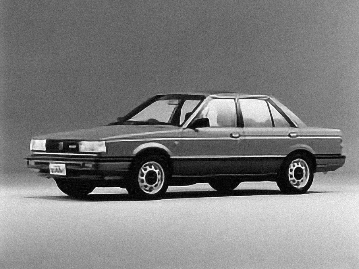 Nissan Sunny Coupe – årsmodell 1985 i bild Bild på Nissan Sunny Coupe – årsmodell 1985