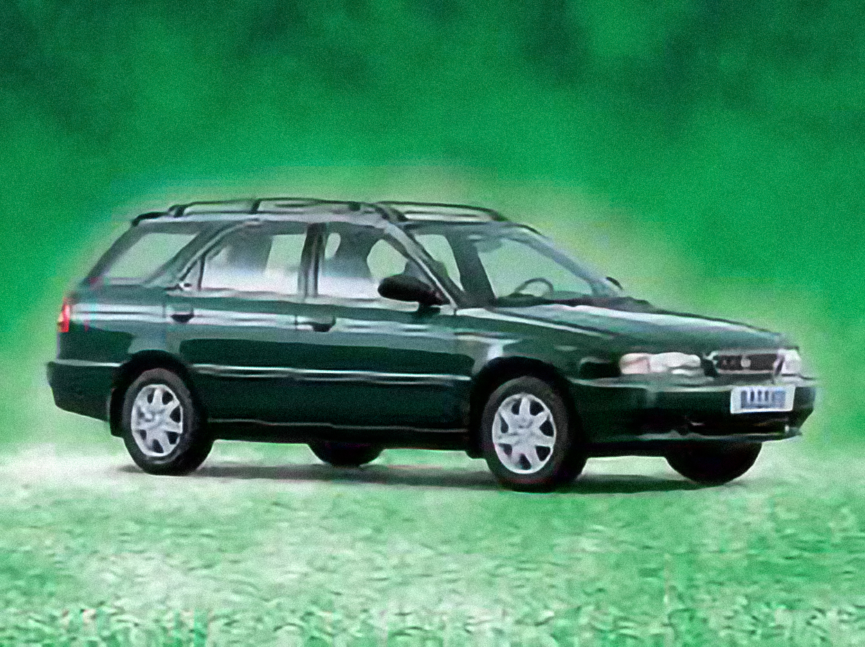 Suzuki Baleno 1.3 Break – årsmodell 2003 i bild Bild på Suzuki Baleno 1.3 Break – årsmodell 2003