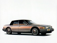 Cadillac Seville – årsmodell 1987 i bild Bild på Cadillac Seville – årsmodell 1987