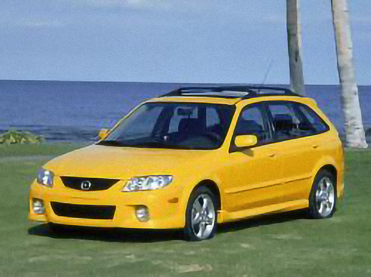 Mazda Protege – årsmodell 2000 i bild Bild på Mazda Protege – årsmodell 2000