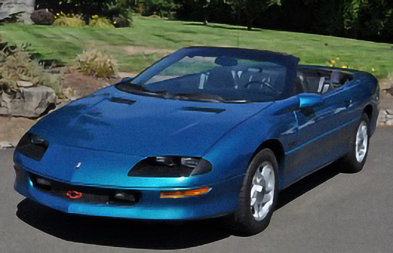 Chevrolet Camaro 3.8 Cabriolet – årsmodell 1998 i bild Bild på Chevrolet Camaro 3.8 Cabriolet – årsmodell 1998