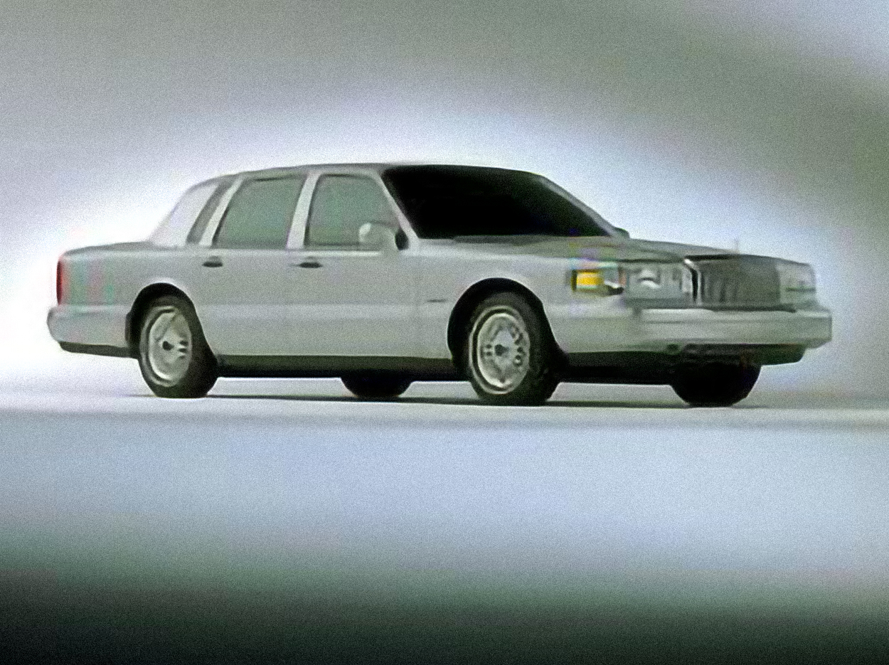 Lincoln Town Car – årsmodell 1991 i bild Bild på Lincoln Town Car – årsmodell 1991