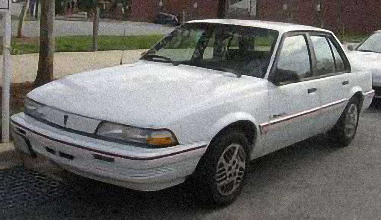 Pontiac Sunbird – årsmodell 1992 i bild Bild på Pontiac Sunbird – årsmodell 1992