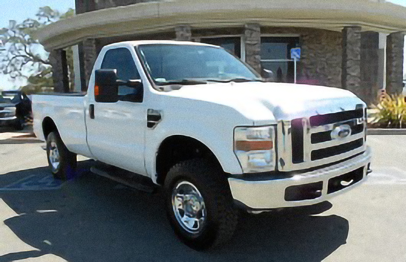Ford F-250 XL – årsmodell 2010 i bild Bild på Ford F-250 XL – årsmodell 2010