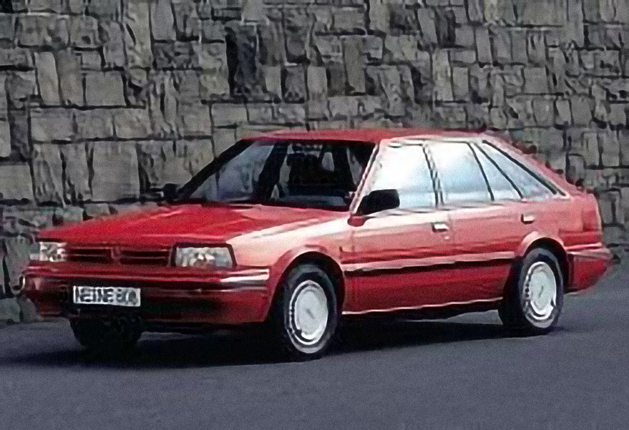 Nissan Bluebird Break – årsmodell 1985 i bild Bild på Nissan Bluebird Break – årsmodell 1985