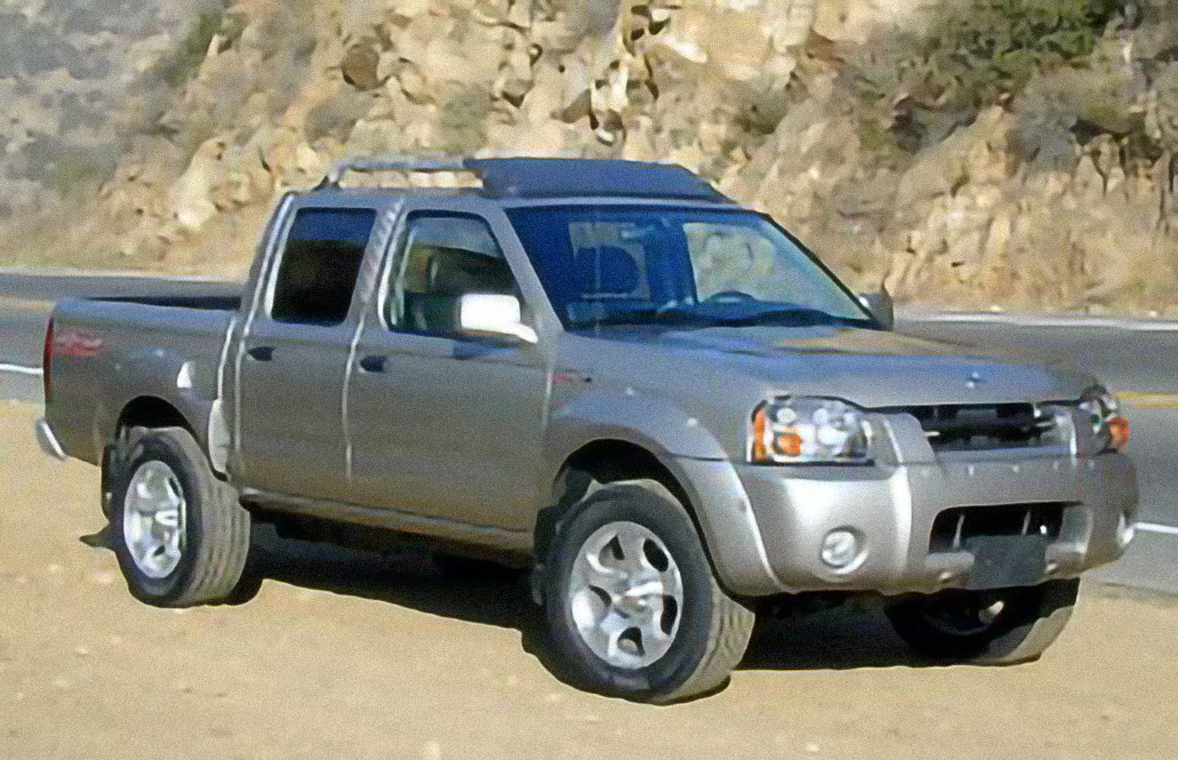 Nissan Frontier XE V6 King Cab Desert Runner – årsmodell 2004 i bild Bild på Nissan Frontier XE V6 King Cab Desert Runner – årsmodell 2004