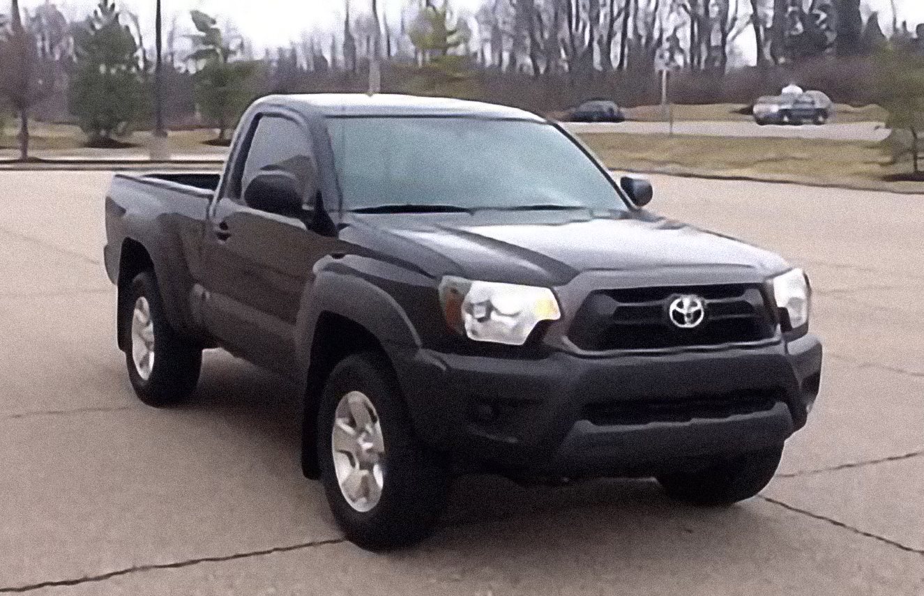Toyota Tacoma Access Cab 4×4 4.0L V6 6-Speed Manual – årsmodell 2013 i bild Bild på Toyota Tacoma Access Cab 4×4 4.0L V6 6-Speed Manual – årsmodell 2013